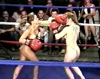 Bare-breasted woman boxing